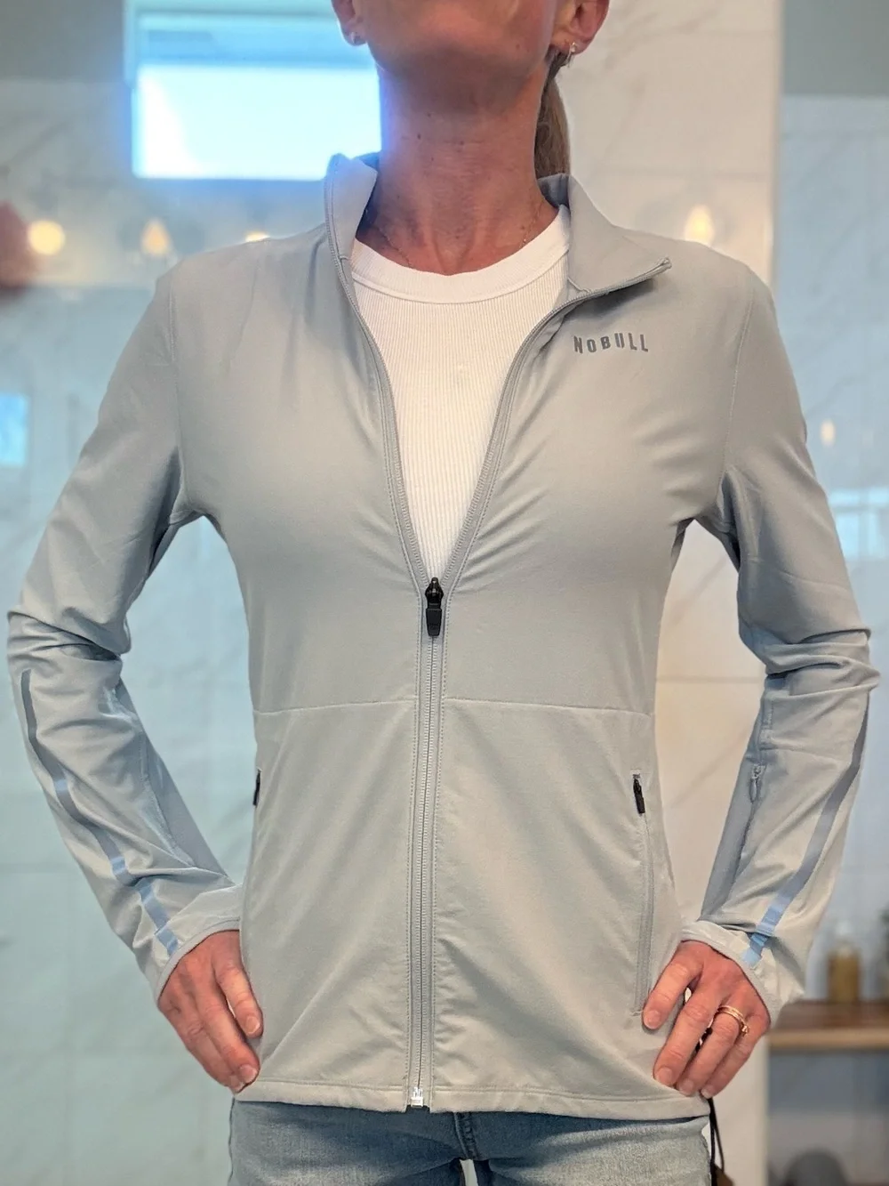 NOBULL Women’s Performance Jacket with Reflective Trim in Quart (silver/gray) - Picture 4 of 5